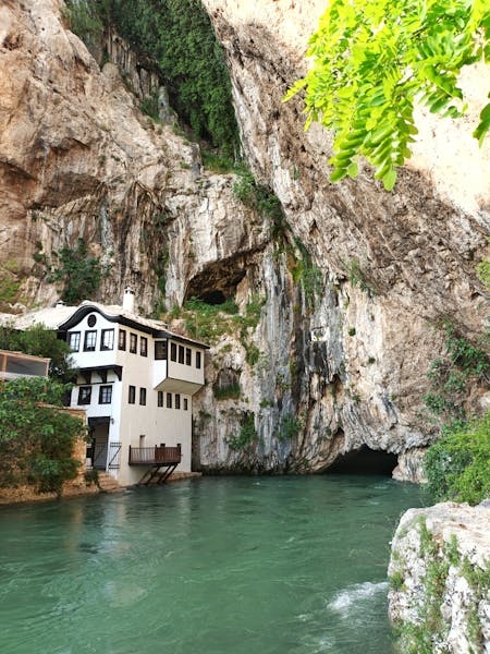 Blagaj Tekke Dervish monastery built into the cliff face at the source of the Buna River